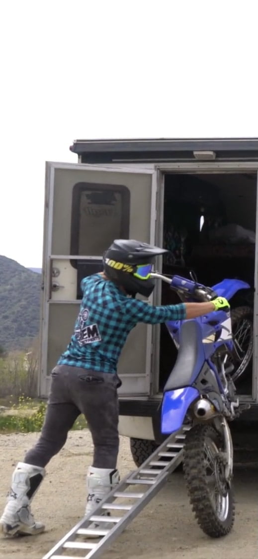 how to load a dirt bike in a truck camper